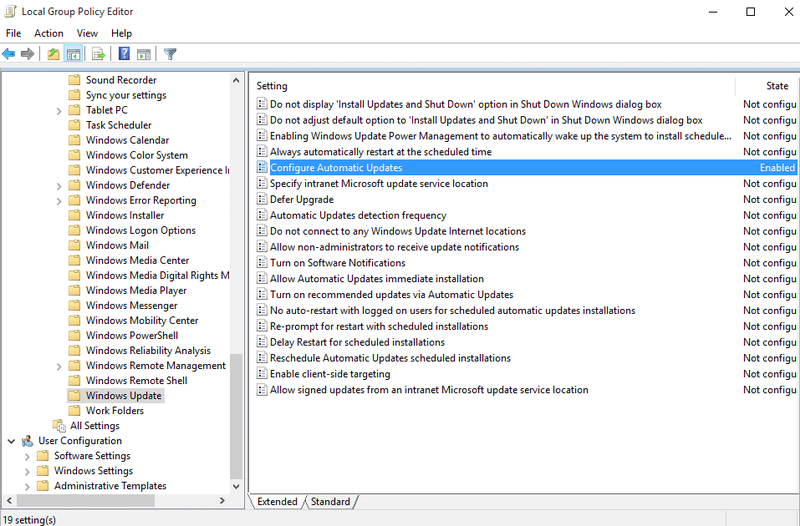 Sottu Windows Update in gpedit.msc truvate Configurate l'aghjurnamenti automatici