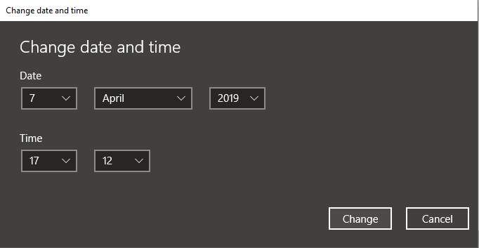 Kliknite na tlačidlo Zmeniť a nastavte dátum a čas manuálne